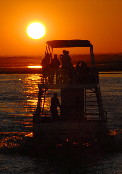 Sunset with a tour boat, Chobe River