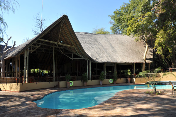 Pool and restaurant, Chobe Safari Lodge