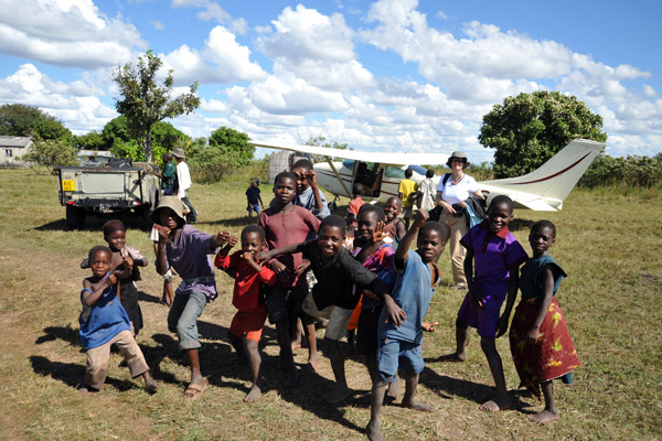 This was the only airstrip on the trip that was close enough to a village to bring out all the kids