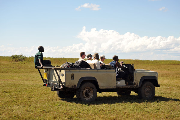 The first batch heads off to the boat to Shoebill Island