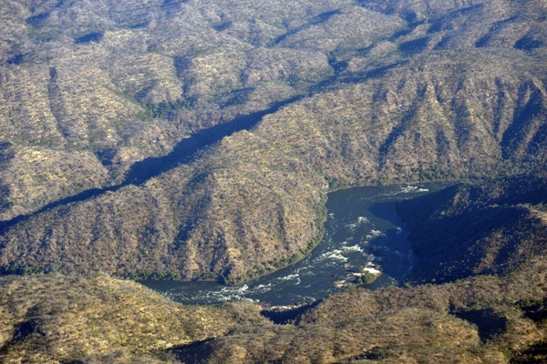Zambezi River rapids with what is an island in low water season (S17 55.0/E026 08.3)
