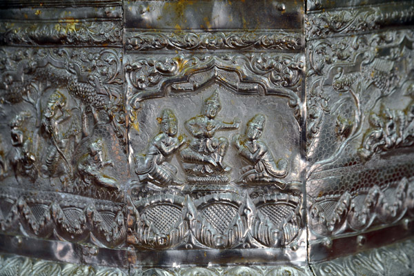 Detail of the silver base of one of the gold images