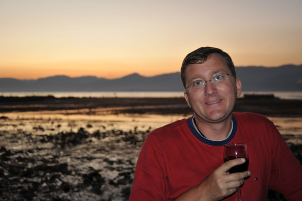 Enjoying a glass of Myanmar red wine on the terrace at Myanmar Treasure Resort, Inle Lake