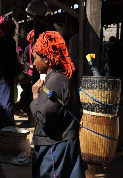 Woman with a basket on her back, Indein Market