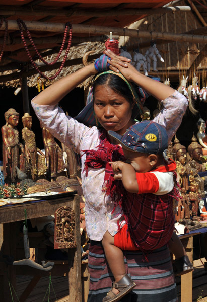 Woman with a baby at Indein Market