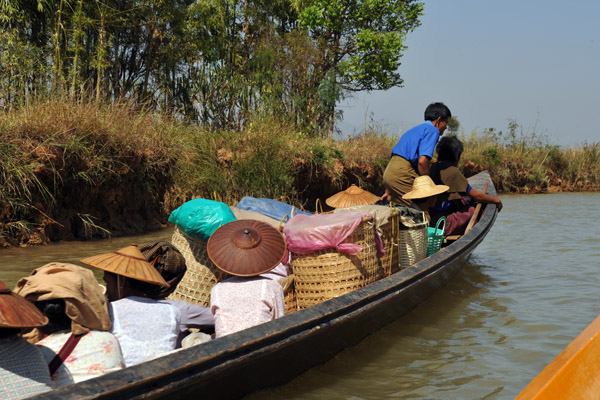 Packed longboat on the Indein River