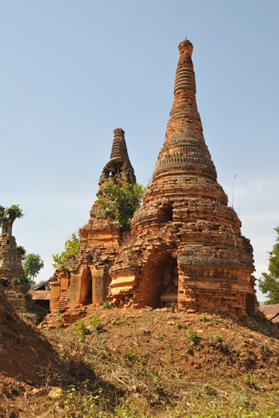 Crumbling ruins of stupas only recentlly freed from the jungle