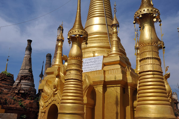 Near the top, many of the stupas have been fully restored and appear brand-new