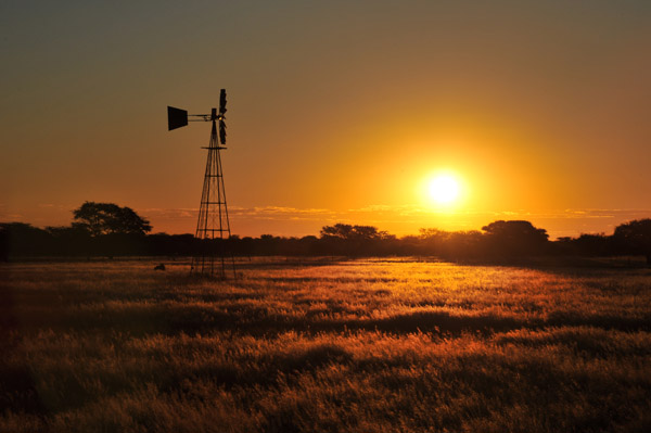 Sunset with a windmill, Eureka Farm, Namibia