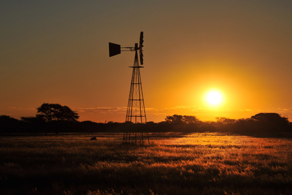 Sunset with a windmill, Eureka Farm, Namibia