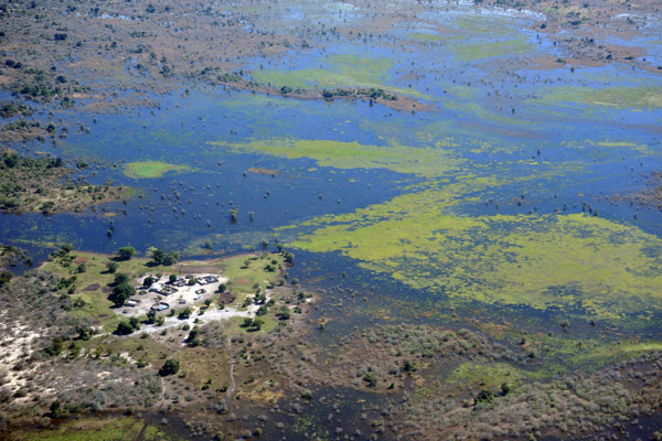 Small village on a patch of dry land in the flooded Eastern Caprivi, Namibia