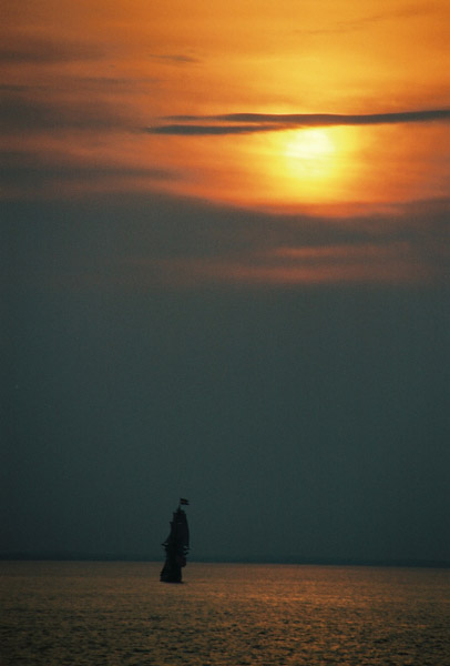 Sailing ship on Delaware Bay at sunset