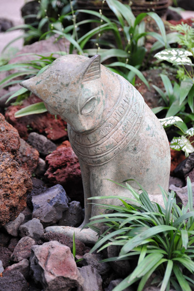 Small cat sculpture, The Mist House, National Orchid Garden