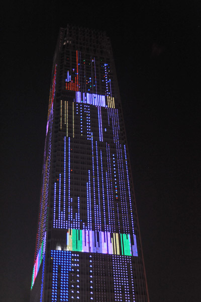 China World Trade Center Tower III illuminated at night