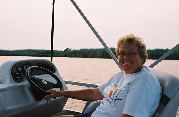Mom on her boat at Sandbridge