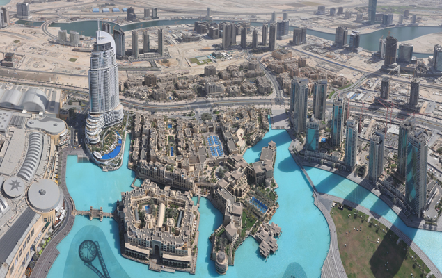 Panoramic View from the observation deck of Burj Khalifa looking at the Dubai Fountain lake and the Old Town Island