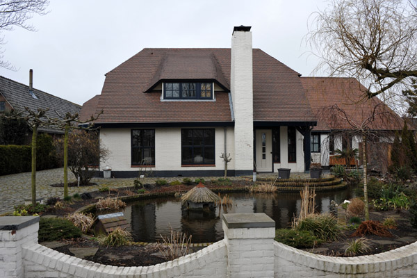 Modern house with a small pond, De Zilk