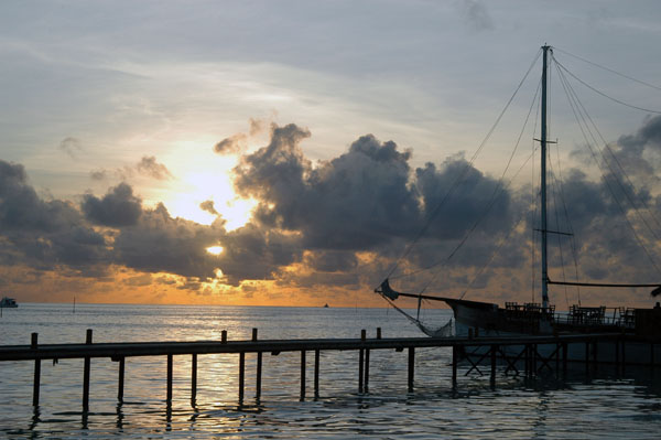 Sunset behind the 1919 Bar boat, Meeru Island Resort
