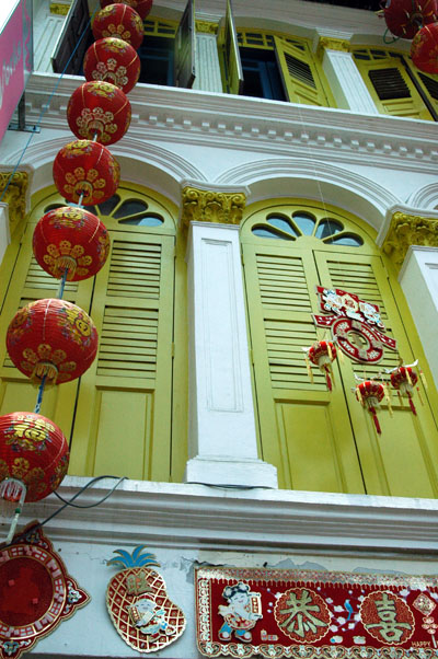 Lanterns adorning a Chinatown house, Pagoda St