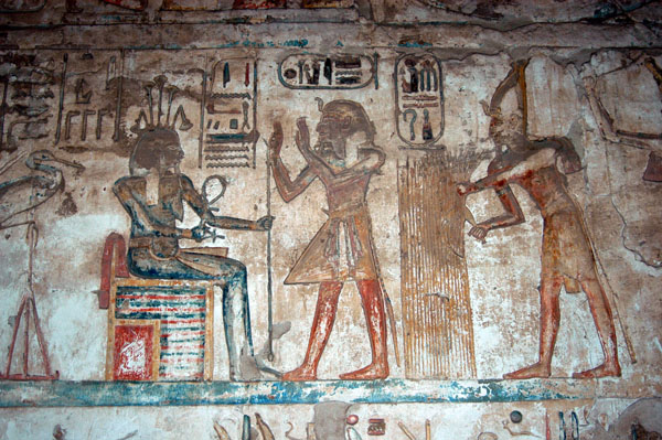Ramses III harbesting corn in an offering to Hapy, the Nile god