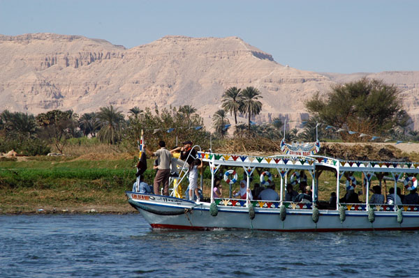 Another tour boat along the West Bank
