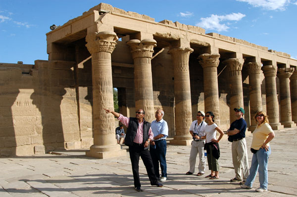 Ahab in front of the Colonnade pointing out the features of the First Pylon