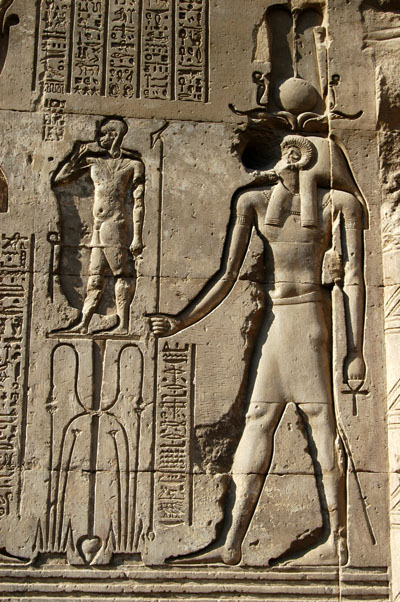Khnum as the creator forming a child on his potters wheel