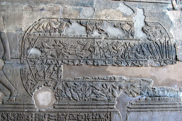 Nile fish and birds in a net. The hieroglyphic inscriptions beneath date from 250 AD and are the last known ever recorded