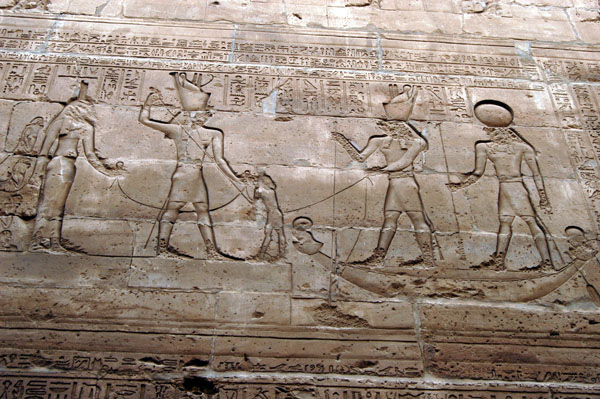 Left, Isis and Horus, right Horus and Ra
