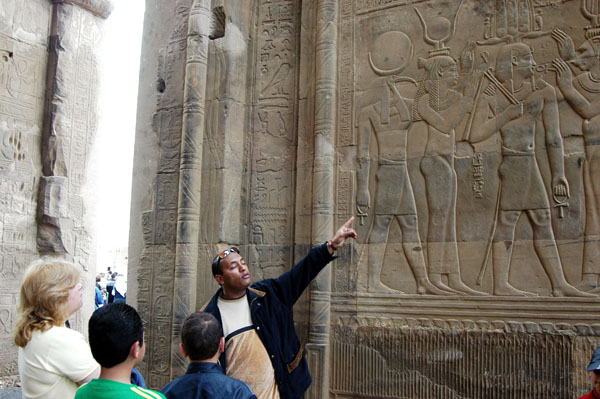 Ahab explaining the relief of Ptolemy XII at Kom Ombo