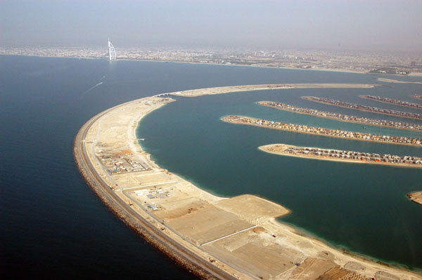 The outer ring of Palm Jumeirah with the Burj al Arab in the distance
