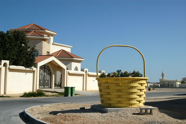 Picnic basket flower pot in a residential area of Al Khor