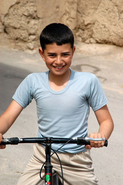 Ehsan, a boy from Naein on his bike