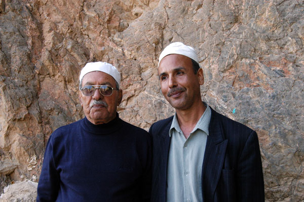 Zoroastrian men wear white caps