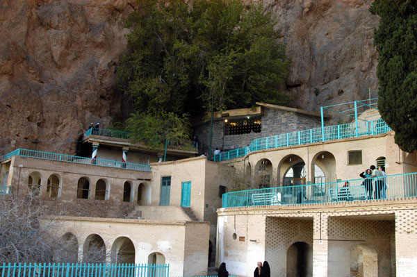 The temple is built into the cliff where the spring is located