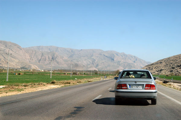 Road passing through a fertile valley, Fars Province