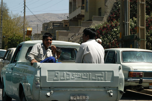 Boys in the back of an Iran Khodro pickup truck, Shiraz