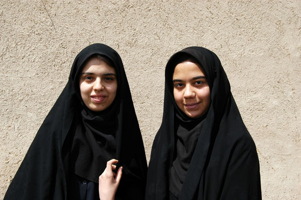 Iranian girls on top of the Amir Chakhmaq during a visit to Yazd during No Ruz