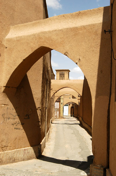 Archways in an alley leading north from Amir Chakhmaq Square