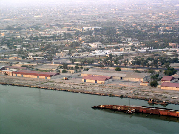 Basrah docks with shipwreck, Iraq