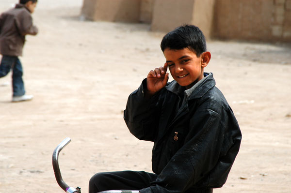 A local Yazdi boy on his bike near the Ab Anbar Rostam Giv