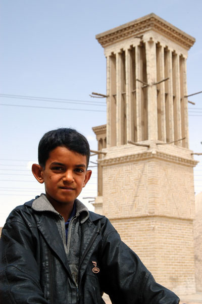 Iranian boy with a Badgir (windtower)