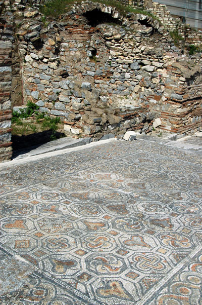 5th Century mosaic walkway in front of shops lining Curetes Way