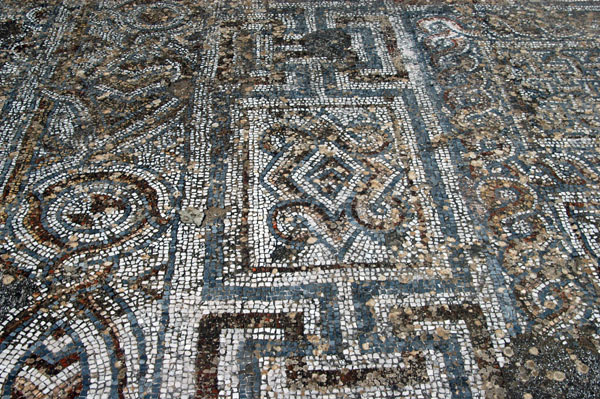 5th Century mosaic walkway in front of shops lining Curetes Way