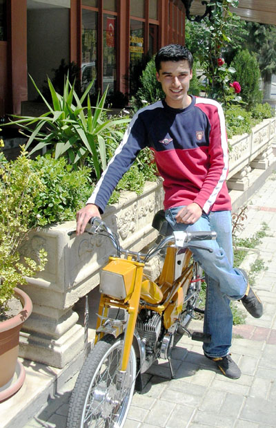 Showing off his motorbike