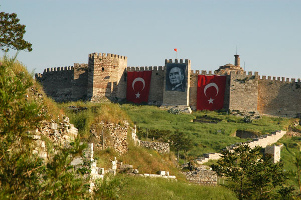 Turkish flags and a large portrait of Atatrk on the Seluk Citadel