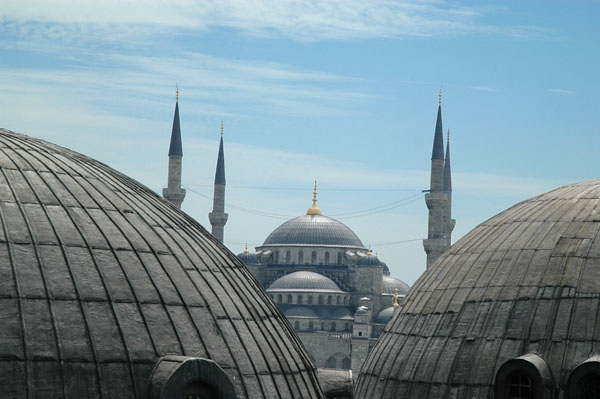 The Sultanahmet Mosque (Blue Mosque) seen through an open window of the Aya Sofya