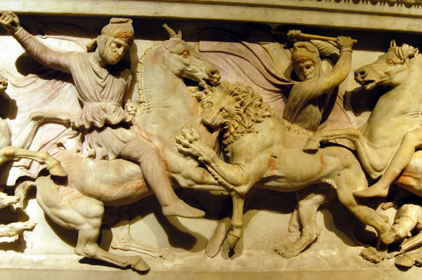 The opposite side of the Alexander Sarcophagus depicts a lion hunt