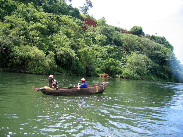 Fisherman in a canoe on the Nile, Uganda