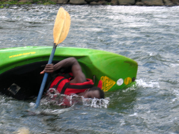Kayaker takes a roll